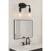 Sunset Lighting Clyde Vanity, Steel Round Glass Clear Seedy Matte Black Finish - 3 of 3