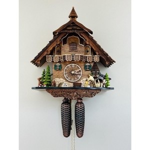 Eight Day Cuckoo Clock – 13 in Height – Cottage Turret with Animated Man Chopping Wood – By River City Clocks - 1 of 4