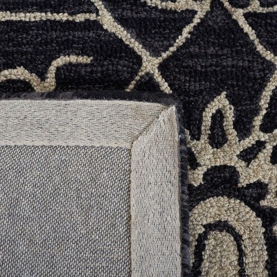 Handmade Black and Ivory Floral Wool Runner Rug