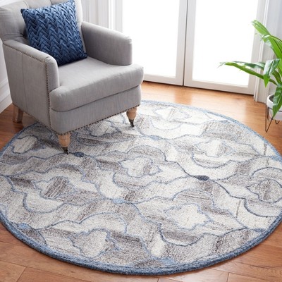 Handmade Blue and Brown Round Wool Area Rug, 6'