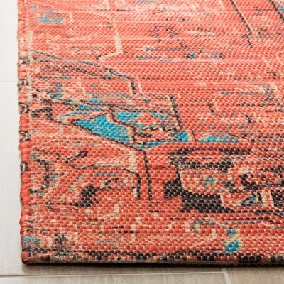 Saffron 5' x 8' Rust and Blue Synthetic Area Rug