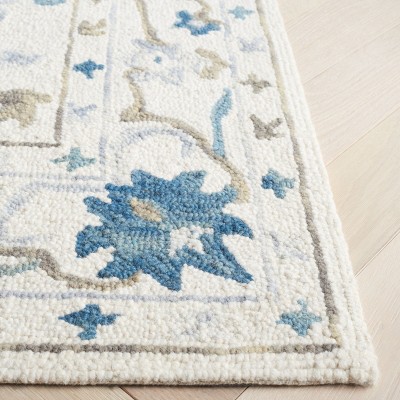 Ivory and Blue Handmade Wool Floral 3' x 5' Area Rug
