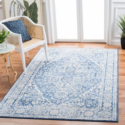 Ivory and Navy 8' x 10' Synthetic Washable Reversible Area Rug