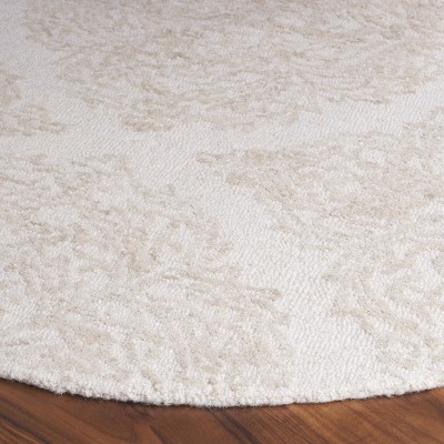Ivory and Beige 6' Round Hand-Tufted Wool Rug