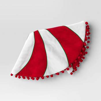 16" Reversible Peppermint Swirl to Solid Mini Christmas Tree Skirt with Pom Poms Red/White - Wondershop™