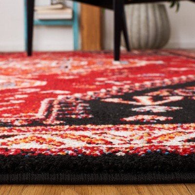 Antiquity Charm 79" Round Black Synthetic Area Rug