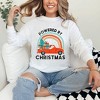 Simply Sage Market Women's Powered By Christmas Long Sleeve Garment Dyed Tee - 2 of 4