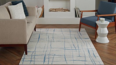 Whimsicle Blue and Ivory Abstract Round 8' Area Rug