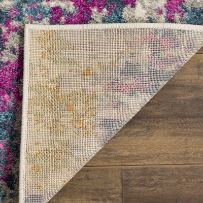 Ivory and Blue Abstract Synthetic Area Rug, 6' x 9'