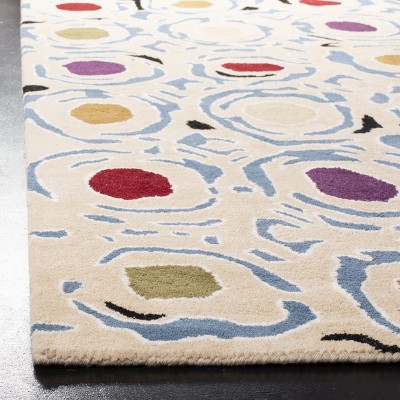 Ivory and Multicolor Handmade Wool Area Rug, 6' x 9'