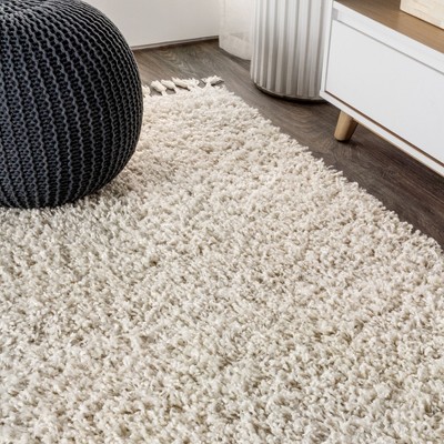 Cream 8' x 10' Reversible Shag Area Rug with Tassels