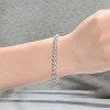 Guili Sterling Silver Rhodium Plated Clear Round Cubic Zirconia 3-Stone Link Bracelet, Modern and Sparkling Design for Stylish Glamour - 3 of 3