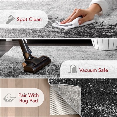 Black Abstract 10' x 14' Synthetic Easy Care Area Rug