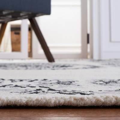 Empire Black and Ivory Hand-Tufted Wool Area Rug