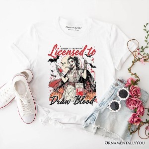 Licensed to Draw Blood Halloween Nurse T-Shirt, Groovy Tee for Spooky Season| OrnamentallyYou - 1 of 4