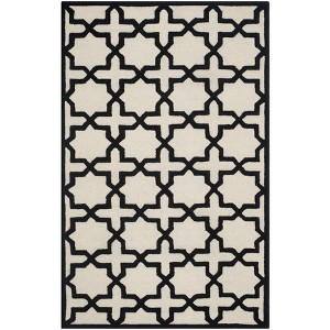 Cambridge CAM125 Tufted Indoor Rug - Safavieh - 1 of 3