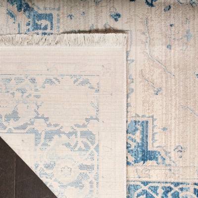 Ivory and Blue Hand-Knotted Synthetic 4' x 6' Area Rug