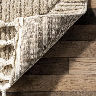 Beige Geometric 5' x 7' Synthetic Area Rug with Tassels