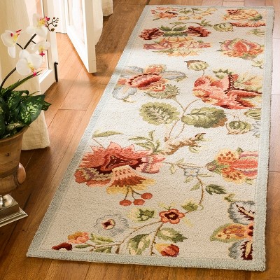 Handmade Light Blue Floral Wool Rectangular Area Rug