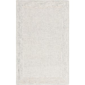 Ebony EBN425 Hand Tufted Indoor Rugs - Safavieh - 1 of 4