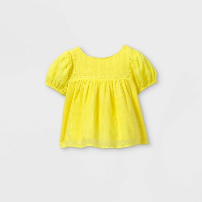 yellow short sleeve top