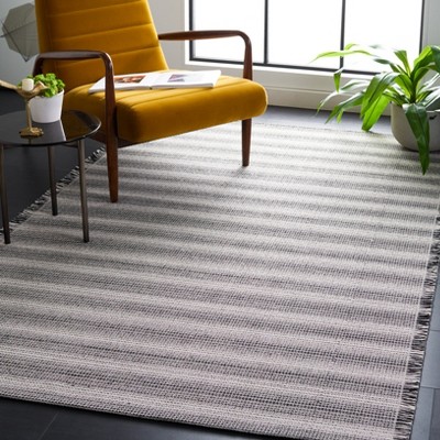 Ivory and Black Striped Synthetic 8' x 10' Area Rug