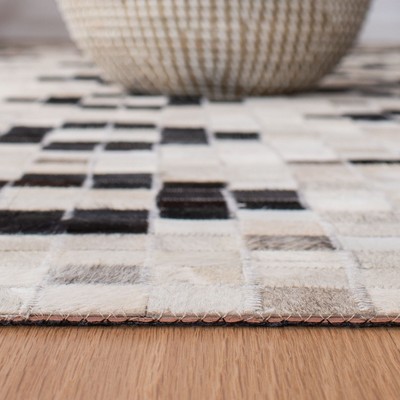 Contemporary Geometric Hand-Knotted Black Cowhide Area Rug