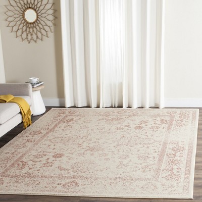 Oversized Ivory and Rose Synthetic Area Rug, 11' x 15'