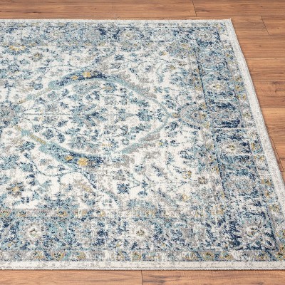 Ivory and Blue Oriental Synthetic 8' x 10' Area Rug