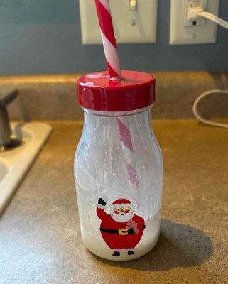 Christmas Milk For Santa In Bottle With Straw And Peppermint Candy