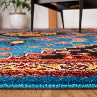 Antique Patina Blue Synthetic Rectangular Area Rug 5'3" x 7'6"