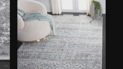 Elysian Grey & Rust Round Synthetic Area Rug - 65" Diameter