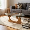 HomeRoots 54" Clear and Brown Glass and Wood Triangle Abstract Coffee Table - 2 of 4