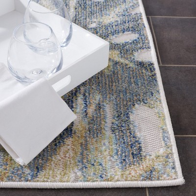 Light Green and Ivory Floral Synthetic Area Rug