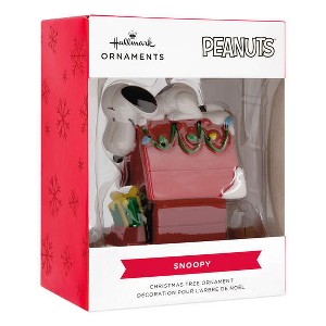 Peanuts® Snoopy on Holiday Doghouse Hallmark Ornament - 1 of 3