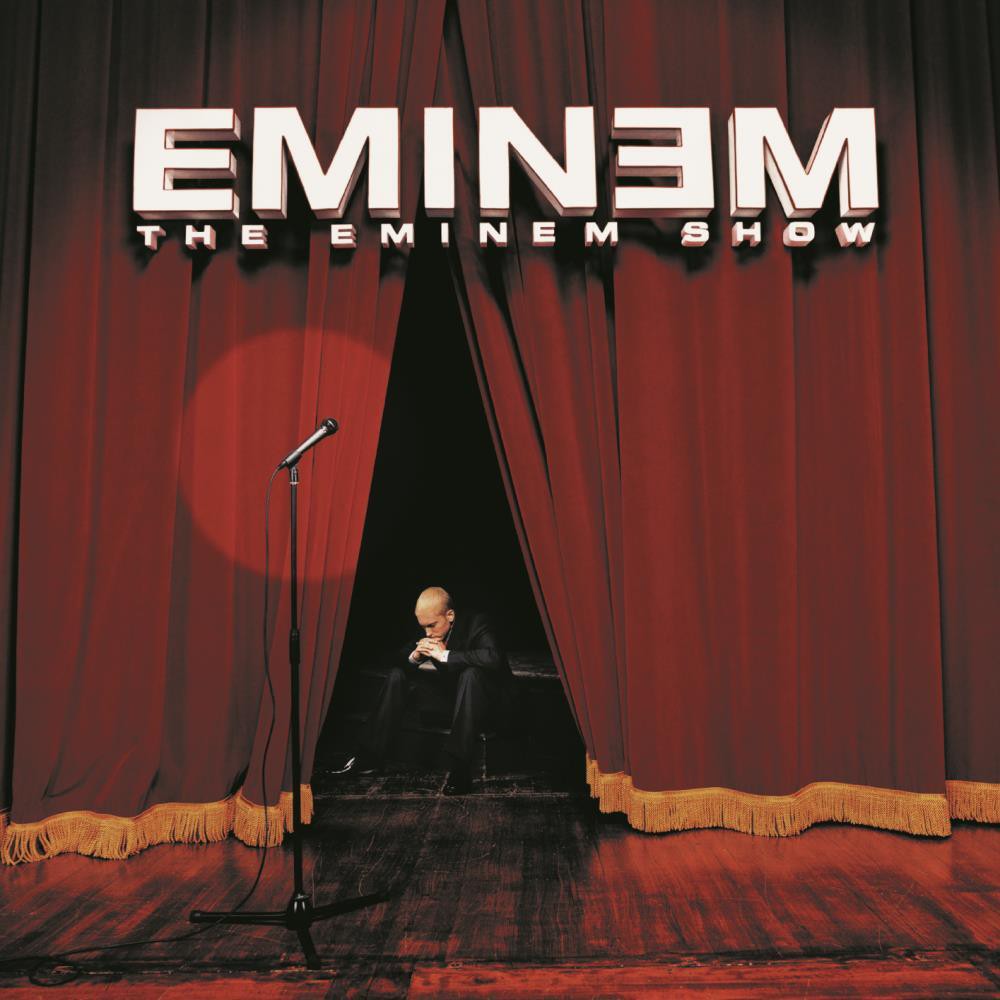 Eminem - The Eminem Show (Edited) (CD) Rolling Stone (7/11/02, pp.107-8) - 4 stars out of 5 -  ...[This] may be the best rap-rock album in history....THE EMINEM SHOW has the self-assurance of an artist at the top of his game and 'the' game...  Rolling Stone (12/26/02, p.106) - Included in Rolling Stone's  50 Best Albums of 2002  Spin (1/03, p.70) - Ranked #5 on Spin's list of 2002's  Albums of the Year  -  ...On his fourth album, Eminem reflects and shows some real vulnerability, flipping in a blink from evil, sexist drip to sympathetic daddy/son to media-mad trickster.  Entertainment Weekly (6/7/02, pp.73-4) -  ...Em reveals the supposedly real Marshall: embattled entertainer, fervent defender of the First Amendment, and yes, devoted father...like a therapy session in which the shrink bes a human beatbox...  - Rating: B Q (12/02, p.66) - Included in Q Magazine's  50 Best Albums of 2002  Uncut (1/03, p.95) - Ranked #19 in Uncut's  100 Best Albums of the Year  Uncut (8/02, p.118) - 3 out of 5 -  ...As ever the wit is razor sharp....He's still baring enough of his soul for THE EMINEM SHOW to be compelling theatre.  CMJ (6/24/02, p.4) -  ...Jam-packed with the same vitriol that made Eminem a household name to begin with...  Vibe (8/02, pp.155-6) - 4 out of 5 -  ...[The] capacity to mix social commentary and self-parody and turn the whole thing into an amazing record is what makes Eminem so interesting...  NME (Magazine) (6/1/02, p.36) - 9 out of 10 -  ...A more personal, vulnerable, even-gulp!-mature artistic vision....SHOW is bigger, bolder and far more consistent than its predecessors...introspective without being self-pitying, expansive in scope without being pompous, exploring new directions without disappearing up its own arse. Its genius is mighty. It's the greatest 'Show' on earth.  Disc 1 1. Curtains Up [Skit] - (skit) 2. White America 3. Business 4. Cleanin' Out My Closet 5. Square Dance 6. Kiss, The - (skit) 7. Soldier 8. Say Goodbye Hollywood 9. Drips - (featuring Obie Trice) 10. Without Me 11. Paul Rosenberg (Skit) - (skit) 12. Sing for the Moment 13. Superman - (featuring Dina Rae) 14. Hailie's Song 15. Steve Berman [Skit] - (skit) 16. When the Music Stops - (featuring D12) 17. Say What You Say - (featuring Dr. Dre) 18. 'Till I Collapse - (featuring Nate Dogg) 19. My Dad's Gone Crazy - (featuring Hailie Jade) 20. Curtains Close [Skit] - (skit)