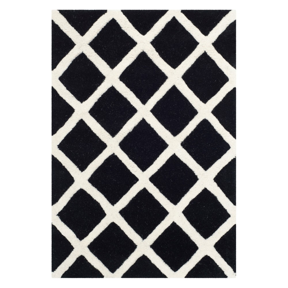 2'x3' Christy Geometric Tufted Area Rug Black/Ivory - Safavieh