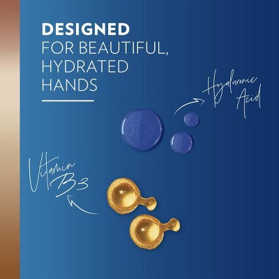 Text reads: "For Beautifully Replenished Hands." The image showcases a close-up of a woman's hands with a light skin tone gently touching, set against a gradient blue background. 