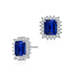 Elegant square stud earring featuring a central cubic zirconia stone surrounded by dazzling accents - 1 of 2