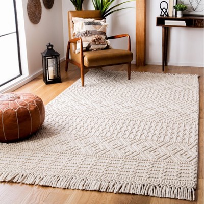 Ivory Coast Artisan Hand-Tufted Wool Rug - 5' x 8'