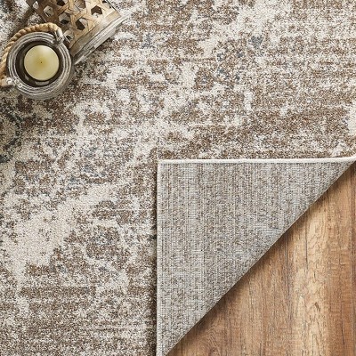 Elegant Beige 5' x 7' Oriental Synthetic Area Rug