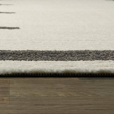 Brynja Off-White and Black Geometric Synthetic Area Rug