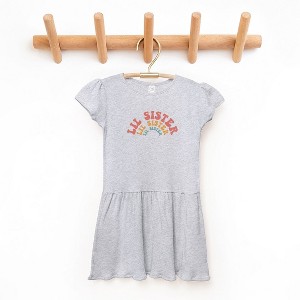 The Juniper Shop Lil Sister Stacked Curved Toddler Graphic Dress - 1 of 3