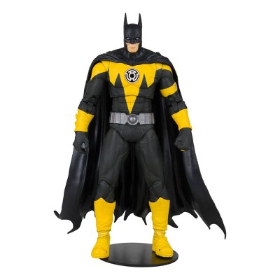 Black and yellow Batman action figure near MacBook Pro photo