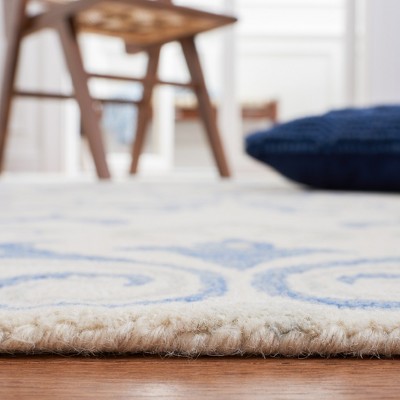 Ivory and Blue Floral Handmade Wool Area Rug, 4' x 6'