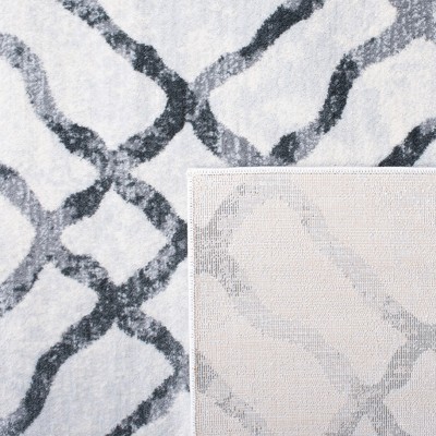 Ivory and Grey 4' x 6' Hand-Knotted Synthetic Area Rug