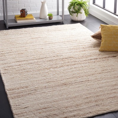 Beige and Ivory Handwoven Wool Shag Area Rug 3' x 5'