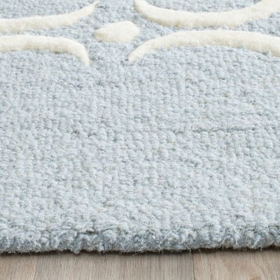Handmade Blue and Ivory Wool Tufted Area Rug