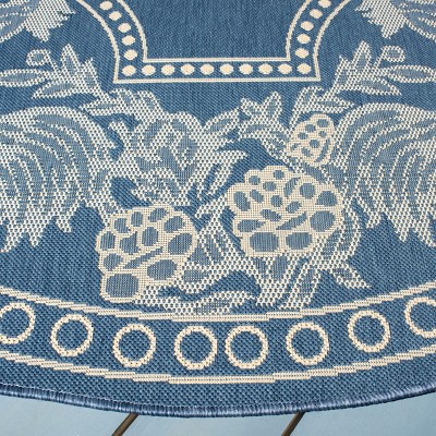 28" Blue and Natural Synthetic Reversible Flat Woven Rug