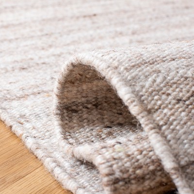 Handmade Ivory and Brown Wool Flat Woven 8' x 10' Area Rug